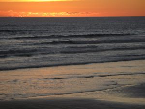 Sunset on Ninety Mile Beach Free Trip Planner New Zealand